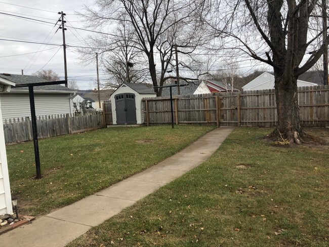 Fenced in backyard and utility shed - 1807 East Ave S