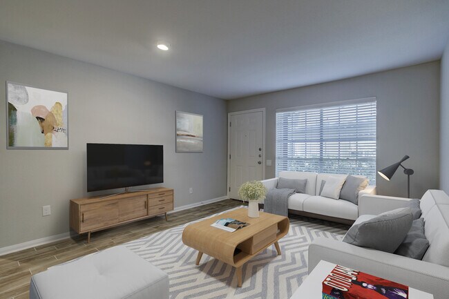 Amplia sala de estar con vistas al exterior. - 1880 White Oak Dr. Apt 119