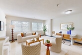 This one-bedroom, one-and-a-half-bath residence at 99 Florence St in Malden, Massachusetts offers a thoughtfully designed layout that maximizes comfort and functionality. The open-concept living and dining area is the heart of the home, featuring expansive windows that flood the carpeted space with natural light and offer pleasant views of surrounding greenery. The room provides generous space for both lounging and entertaining. The kitchen is well-appointed with white cabinetry, light countertops, stainless steel appliances including a refrigerator, dishwasher, and range, and light tile flooring — offering ample storage and a clean, functional workspace. The spacious primary bedroom is a serene retreat, featuring large windows on two walls that invite abundant natural light and garden views, complemented by soft carpeting underfoot. A full bathroom and a half bathroom provide convenience for residents and guests alike, each finished with clean, neutral tones. Throughout the residence, four closets offer exceptional storage capacity, a notable feature that adds to the overall practicality of the space. Light walls and neutral finishes create a calm, cohesive ambiance throughout, making this a comfortable and well-organized home in a convenient Malden location.