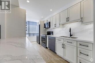 Building Photo - 1131-1131 Steeles Ave W