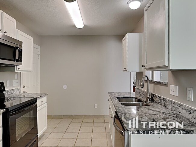 Building Photo - 9312 Tiger Lily Ln