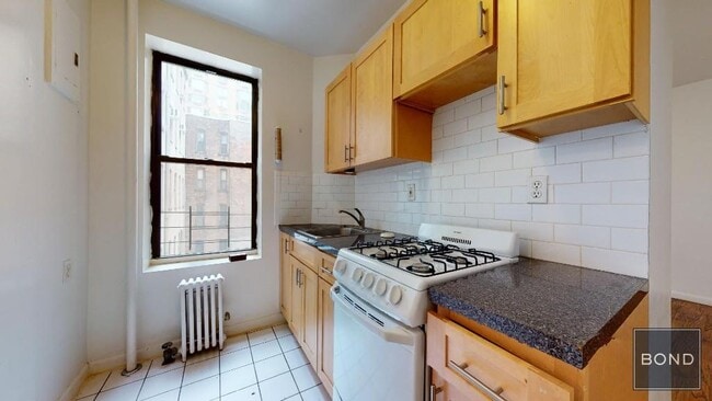 Foto del edificio - 411 E 70th St
