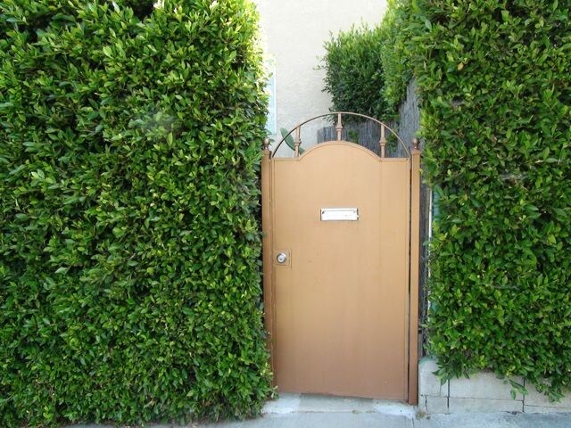 Private entry that leads to private yard - 2501 Elsinore St