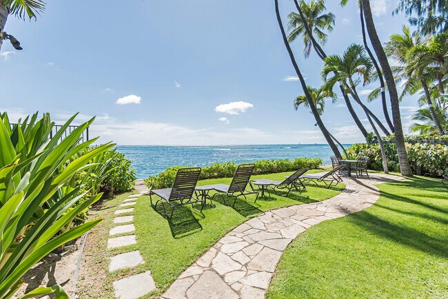 Ocean front sitting area. To the left is stairs leading in to ocean. - 2947 Kalakaua Ave