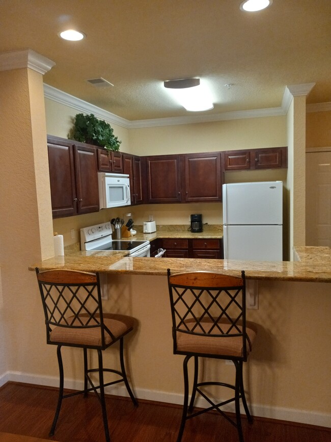 Kitchen View from Dining Room - 8010 Tuscany Way