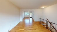 Located at 100 Rock Rd in Hawthorne, NJ, this one-bedroom, one-bathroom unit offers a clean and functional single-floor layout. Warm hardwood flooring flows throughout the main living areas and bedroom, lending a cohesive and inviting feel to the space. The open living and dining area is bright and airy, with natural light streaming in through large windows and an access point to a private balcony, offering pleasant outdoor views. Baseboard heating is present throughout, ensuring comfort year-round. The bedroom is well-proportioned, featuring the same hardwood flooring, a ceiling light fixture, and a closet. The kitchen is equipped with warm-toned wooden cabinetry offering generous storage, a gas range, a refrigerator, and ample counter space — practical and ready for everyday use. The bathroom features white tile flooring, a soaking tub, a vanity with storage, and a window that provides natural ventilation and light. The overall aesthetic of the unit is clean and neutral, with white walls throughout that create a bright, move-in-ready environment well-suited for comfortable everyday living.