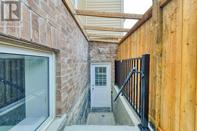 Photo du bâtiment - 74 Henry Smith Ave