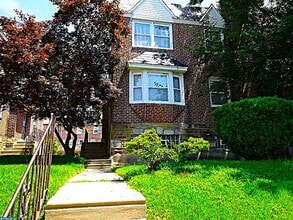 Building Photo - 7703 Woolston Ave