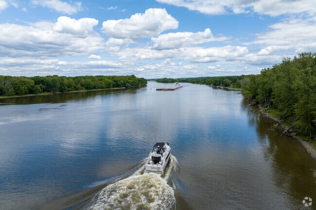 A yacht traveling down the Mississippi River in Inver Grove Heights.