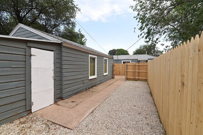 Building Photo - Half Off First Full Month's Rent! Rear Home Nestled In Texas Tech and Downtown Metro Area