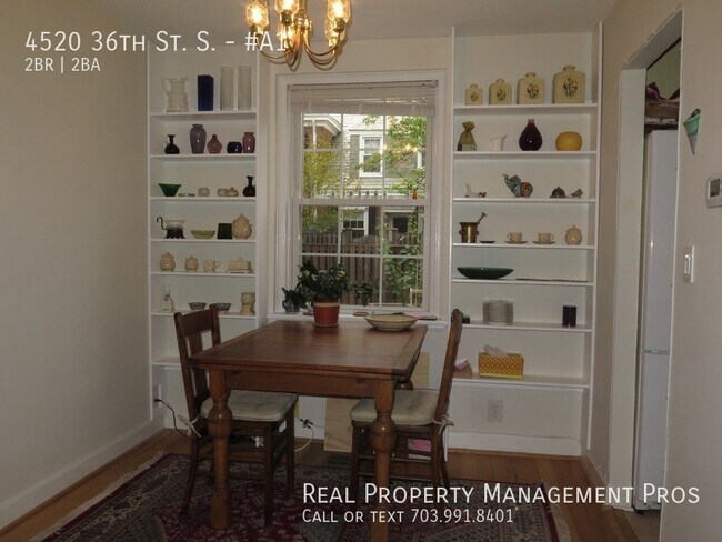 Building Photo - Fairlington End Unit with Huge Patio! 2 Dens!