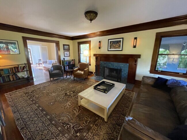 Living Room with Wood Burning Fireplace - 2106 S Victoria Ave
