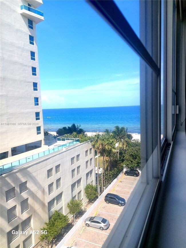 Building Photo - 5005 Collins Ave