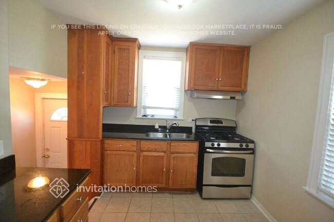 Foto del edificio - 5158 N Mulligan Ave