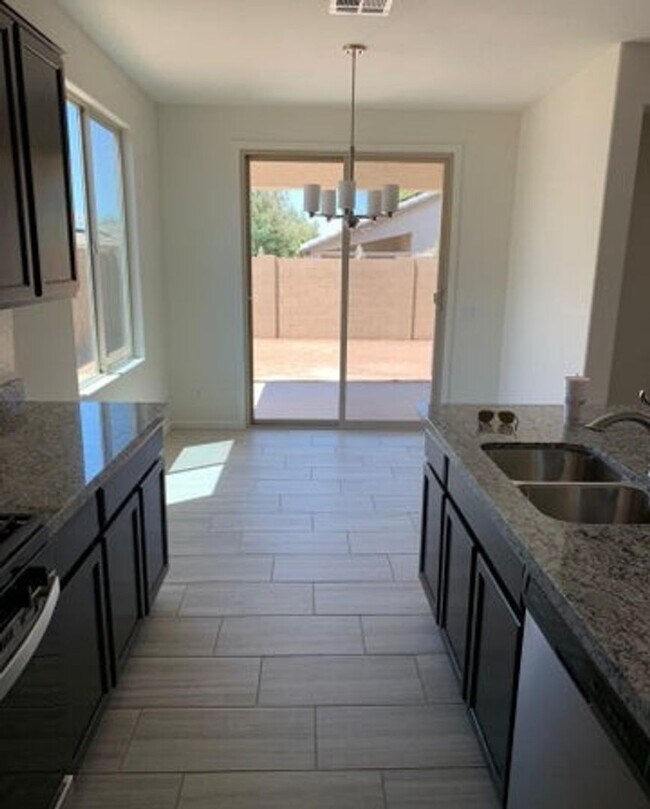 Building Photo - COMING SOON!  This stunning 4-bedroom, 2-b...