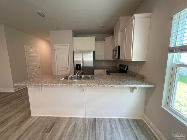 Foto del edificio - 6365 Grove Park Dr