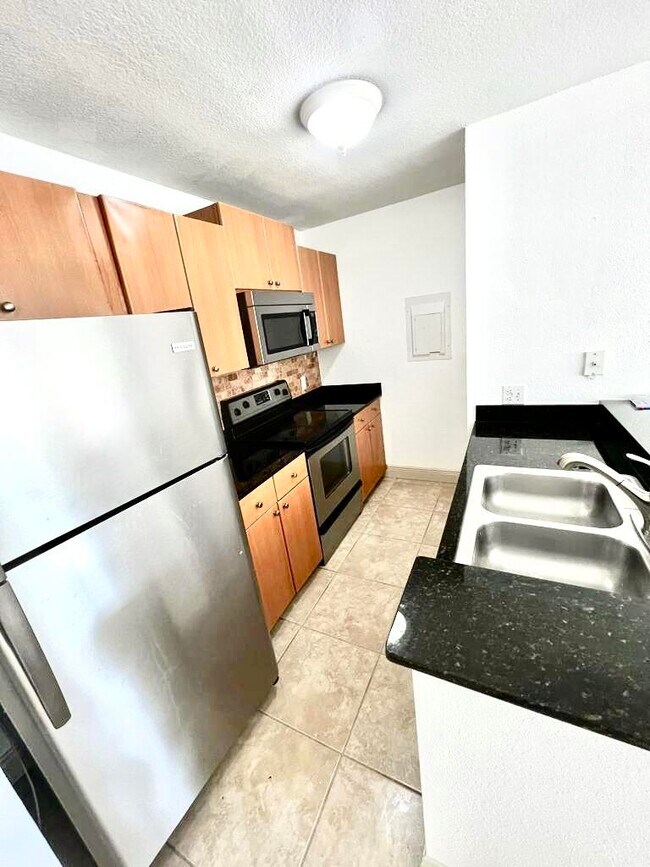 Building Photo - 1705 Palm Cove Blvd