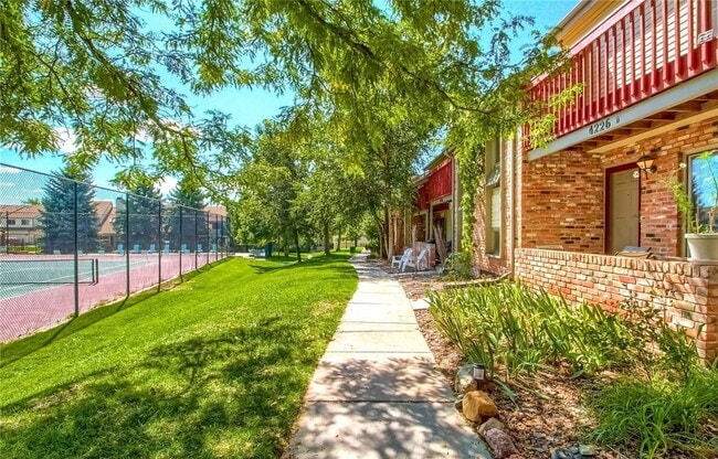 Sidewalk near entrance - 4226 S Granby St Townhome
