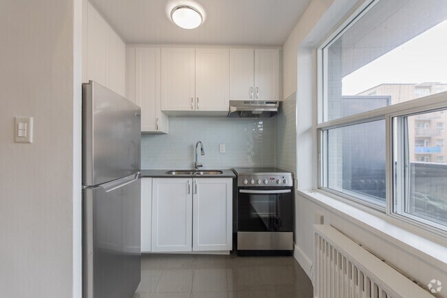 CACHET - 455 pi² - Cuisine - 100 Cosburn Ave