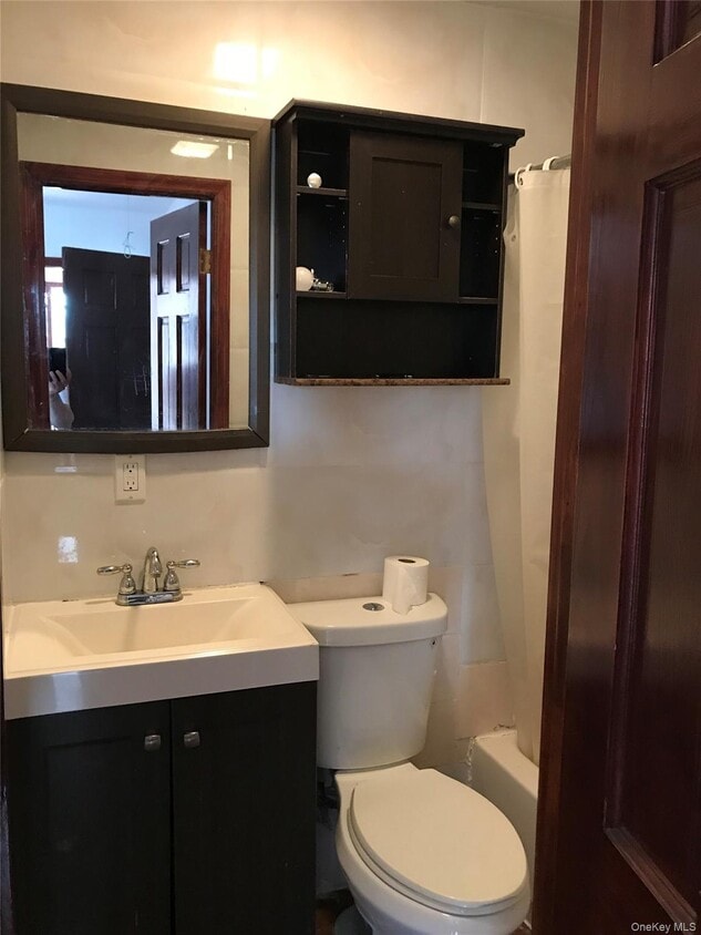 Building Photo - 57-30 Main St