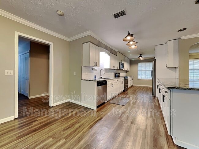 Building Photo - 5256 Magnolia Oaks Ln
