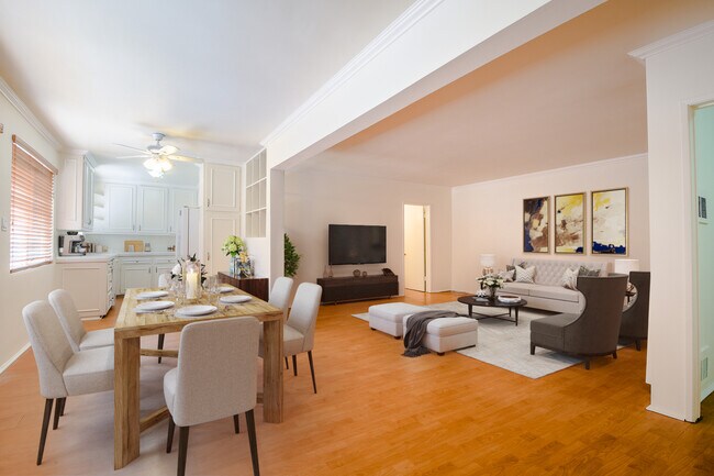 Virtually staged dining area & living room of a similar layout unit. - 4916 Hazeltine Ave