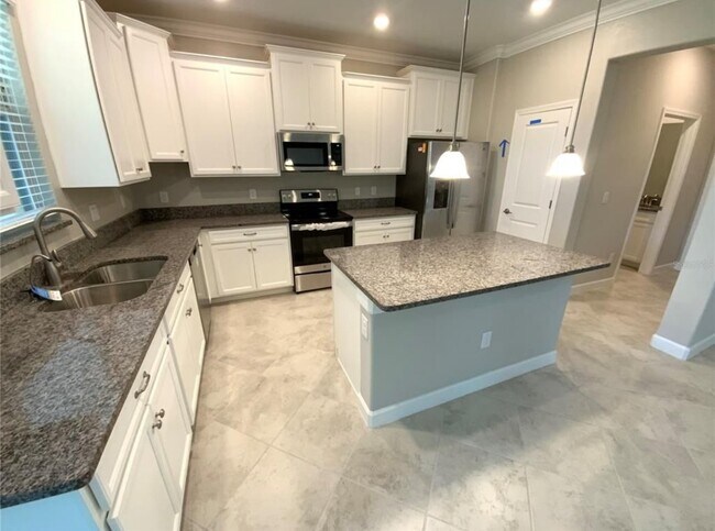 Building Photo - "Beautiful 4-Bedroom gated community home ...