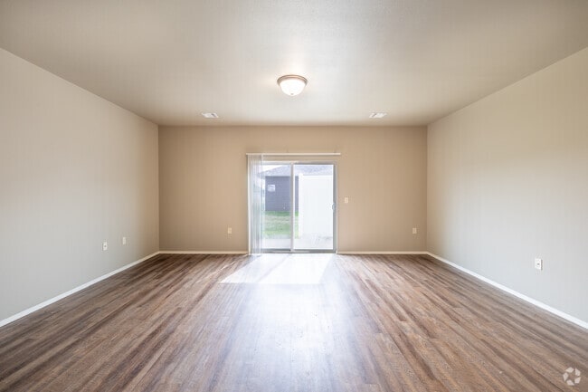 2BR, 2 1/2BA - Living Area - Jackson Heights Apartments & Townhomes