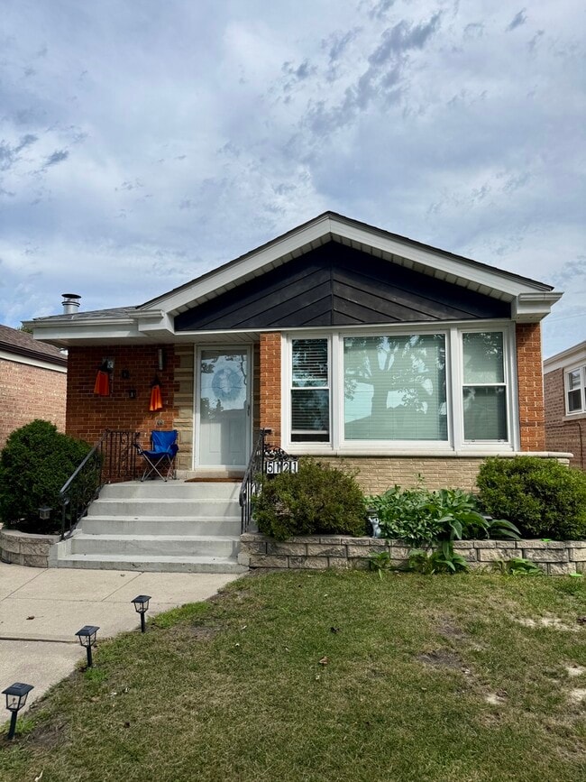 Building Photo - 5121 S New England Ave