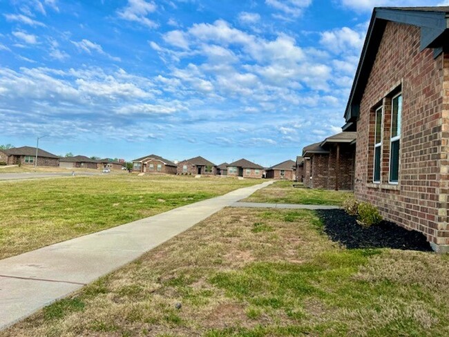 Building Photo - SPRING MOVE IN SPECIAL