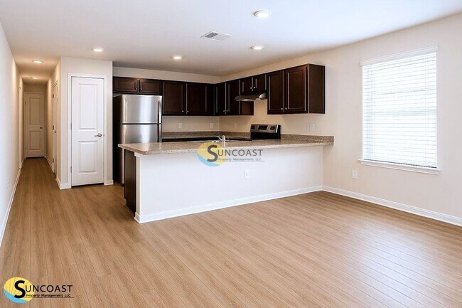 Foto del edificio - 6450 Sweetbay Ln