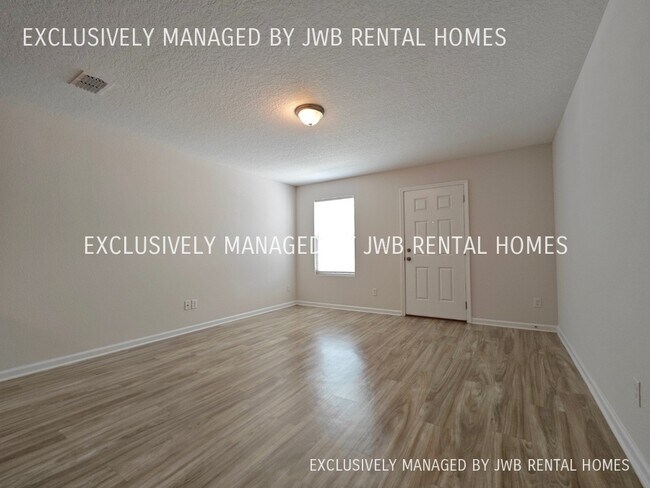 Building Photo - 8498 McGirts Village Ln