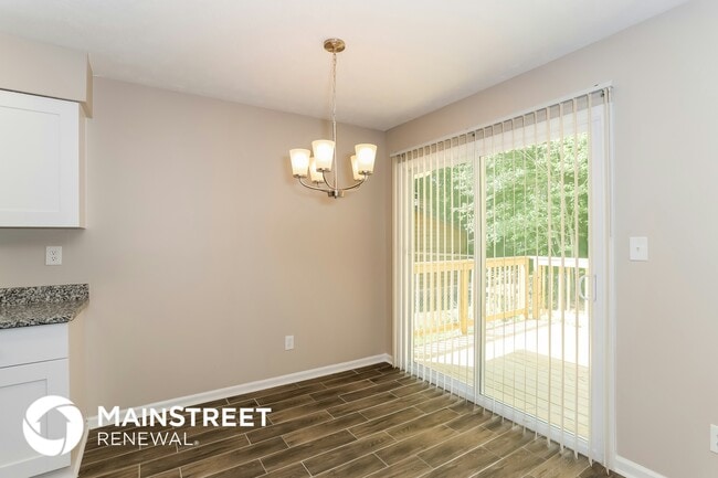 Building Photo - 9073 Woodgreen Way