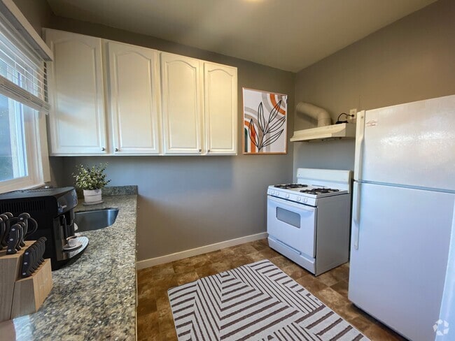 Building Photo - 2044 International Blvd - Sunny Studios an...