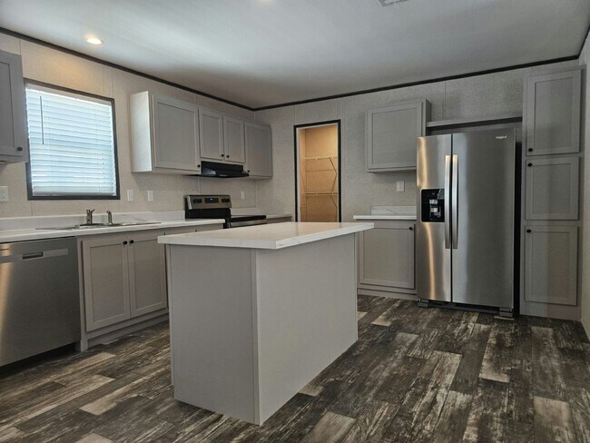 Foto del edificio - 6721 Hidden Oaks Dr