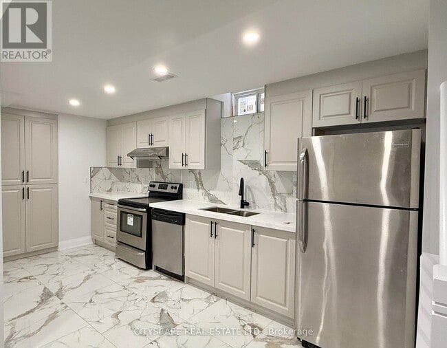 Photo du bâtiment - 5582 Meadowcrest Ave