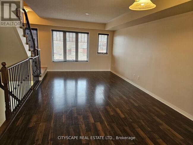 Building Photo - 5605 Oscar Peterson Blvd