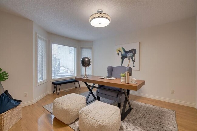 Photo du bâtiment - 210A-212A 12a St NE