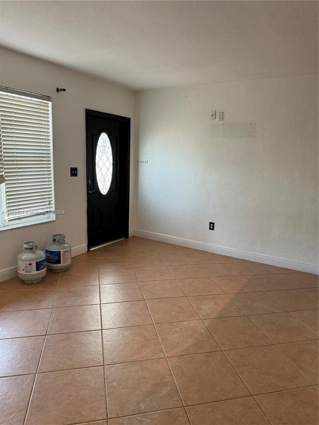 Building Photo - 1570 W 55th Pl