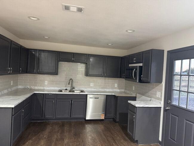 Foto del edificio - 6474 Rock Ridge Dr