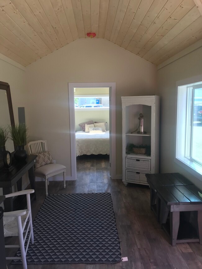 Living area and bedroom - 3914 NE 99th St B