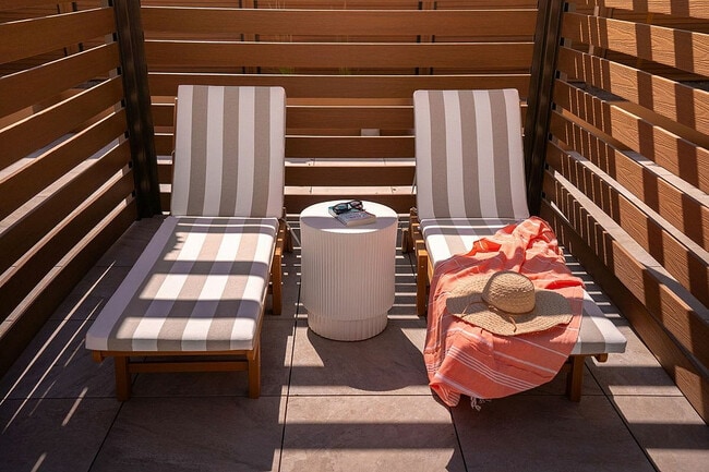 Poolside Cabanas with Lounge Chairs - Current Apartments