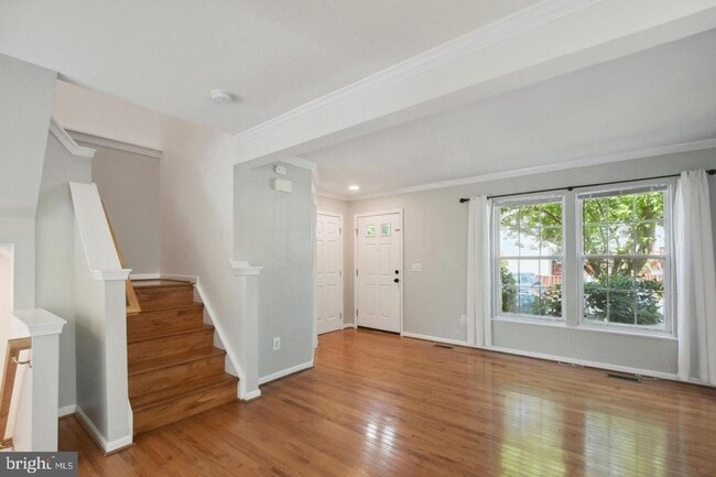 Photo - Amazing, updated end unit townhome backing to trees and open common area in Centre Ridge neighbor...