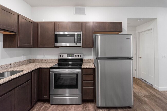Building Photo - Up to $500 off! 1-Bedroom Condos in Colony...
