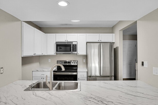 Building Photo - $1,745.95 -  2 Bed, 2 Bath Townhome in CO Springs with In Unit Laundry and Attached Garage!