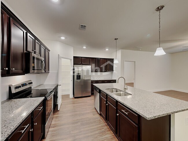 Building Photo - 7058 Creeksong Dr