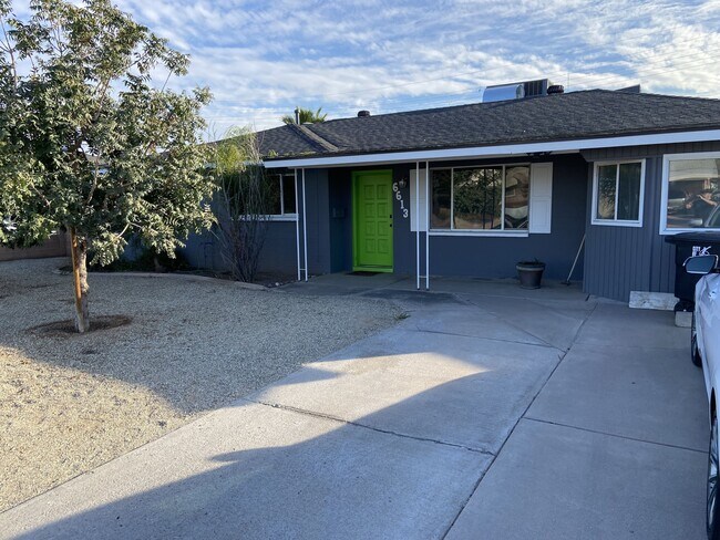 Foto del edificio - 6613 E Belleview St