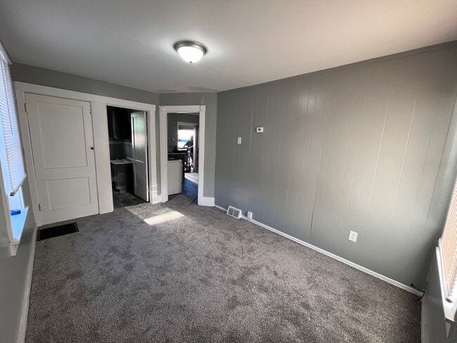 living room into kitchen and bath - 1609 Kenneth Ave