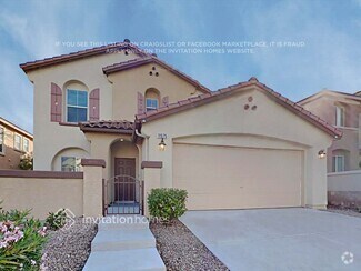Building Photo - 11575 W Aruba Beach Ave