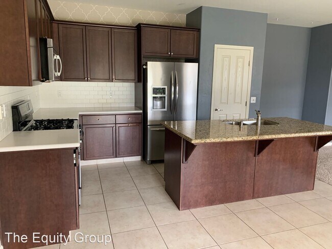 Building Photo - 4 br, 2 bath House - 6325 West Perez Ave